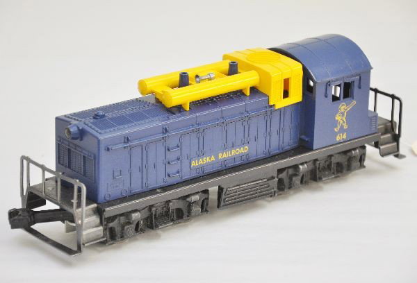 Lionel 614 Alaska Diesel: Clean with dynamic brake unit, light hairline screw crack, shows light playwear, C7+