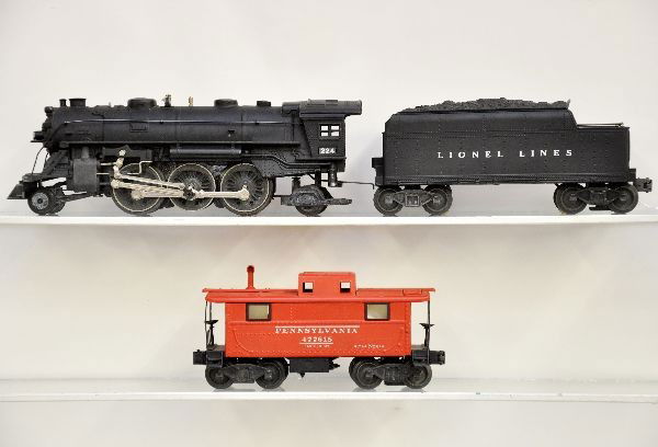 Early Lionel 224 Loco & Caboose: This is the second version Christmas set locomotive. 224 plate, square backed with black handrails; 2224WX tender with mixed FS trucks, no whirly wheels; 2457 PRR caboose, early FS trucks, one truck w