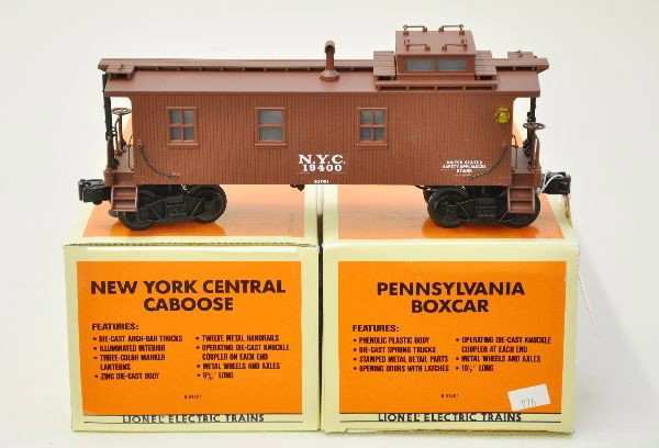 Two Boxed Lionel Scale Freight Cars: 51701 NYC caboose, 51401 PRR boxcar. Both are unrun with original boxes, C9-10