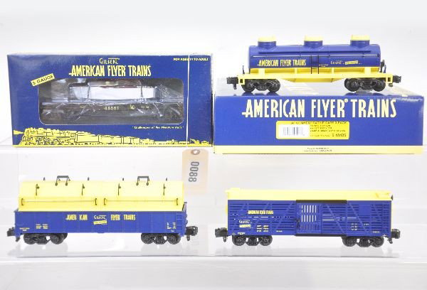 Lionel / AF S Ga Freight Cars: 48561 flat with boat; 48426 commemorative freight car 3-pack. All are new in boxes, C9-10