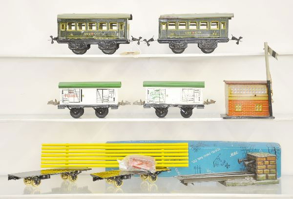 European O Gauge Train Lot: Includes a Bub Semaphore Bank; Unusual Bub French 1st & 2nd and 2nd & 3rd class coaches; Boxed TER Japanese Rail Car set, C9; 2 Bub Pioneer series Beer Cars; Repaired Bing Bumper in C3 condition, othe
