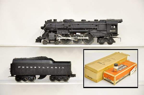 Boxed Lionel 2046 Steam Loco: Complete and nice, just missing 1 jewel; 2671W PRR Tender, incorrect for this loco. Both could use a cleaning but show light playwear, obs, tender is worn, otherwise C7-7+