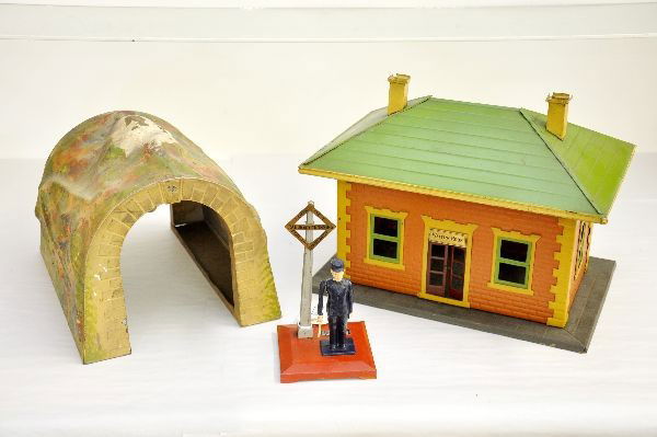 3 Lionel Pre-War Accessories: 122 Station; 119 Tunnel & 1045 flagman, missing flag, all show moderate playwear, otherwise, C6