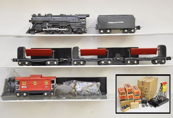 Boxed Lionel Coal Train Set: Pre-War. Circa 1938, 225E steam loco with a 2225W tender gun metal; 3 #3659 ore dump cars (Includes 1 & 1/2 rare #207 cellophane coal bags); 2657 caboose and 97 coal elevator. All have worn original b