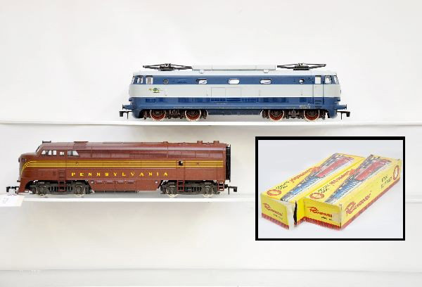 Rivarossi Boxed Locomotives: 7102-C PRR FM diesel, European electric. Both are unrun and have worn original boxes with inserts, missing one flap. Locos are like new, C8