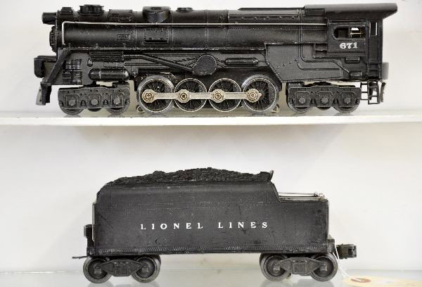 Lionel Early 671 Steam Turbine: 1946 version with smoke bulb, white rubber stamped cab lettering, boiler decal is 97%, engine shows moderate playwear, C6; 671W tender which shows moderate to heavy playwear, C5