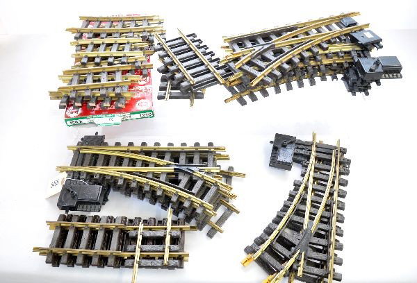 LGB Track & Switches Lot: G Gauge. 5 #120 Switches, 1 ob; 5 1205 switches; Pr 11205 manual switches, plus several sections of fractional straights and curve tracks. All fairly clean & ready to use, with 1 ob, heavy so watch sh