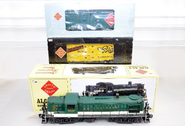 3 Pc. Aristo-Craft Train Set: G Gauge. 22209 Southern RS3 Diesel; 46601 REA Boxcar; 46202? Blatz Beer Car (box states Schlitz), all are unrun, but dusty from display with boxes, otherwise C9