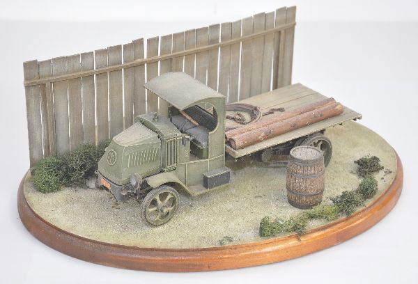 Unusual Mack Military Truck Diorama: Professionally built plastic C-cab Mack model kit that has been nicely detailed and mounted on a 15" landscaped display board, some parts may need reattaching. Displays nicely!