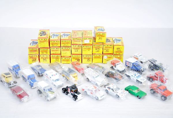 24 Boxed Matchbox 1982 Vehicles: All different and like new condition, C9, all have original boxes, several are dirty.