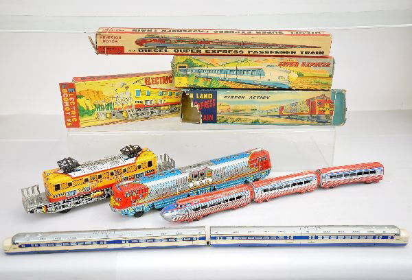 Boxed Japanese Train Toys: Includes a TN 12" UP electric; SM Super Express Set; Cragstan Diesel Super Express; YA Santa Fe Piston Diesel, all have worn original boxes & show light to moderate playwear, C7-8