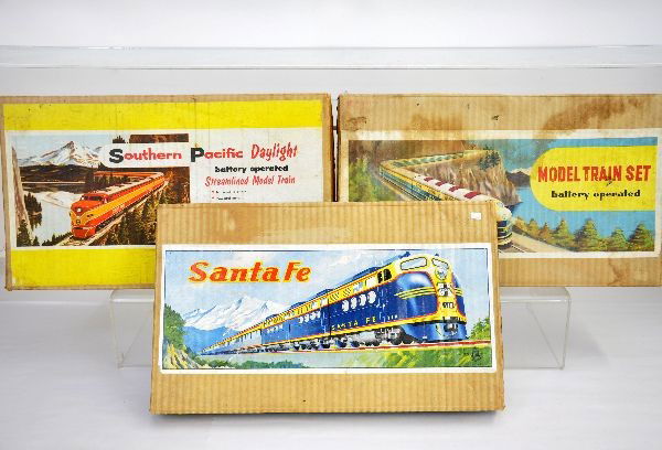 3 Boxed Japanese Diesel Train sets: All about S Gauge Size & battery op. The B&O and Santa Fe sets are M. Tsukuda and the SP set is Dakin, all have track and appear lightly used with set boxes & some inserts, C8