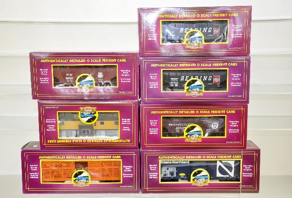 7 MTH Premier Freight Cars: Hoppers- 20-97447 PRR; 90125D Reading; 90020A NH; 97450 Reading; 91083 Reading Caboose; 93061 ON Boxcar; 94504 D&RG Stock Car, unrun, obs C9