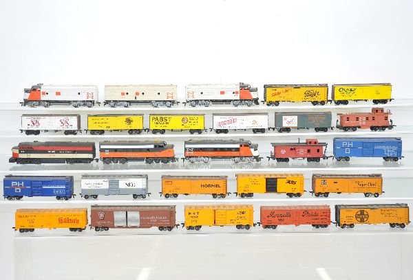 30+ Pc HO NH Diesel Freight Lot: Includes 3 early Athearn NH diesels with an assortment of freight cars by Athearn, Varney, Roundhouse and others. All need a good cleaning or run them nicely "aged". Sold As-Is so examine photos close