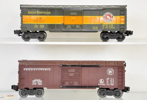 2 Lionel 6464 Boxcars: 6464-200 PRR, type IIa, nice matte patina, C7+; 6464-450 GN, type IIb, decals 100%, but has been over-cleaned in spots, C6 ish