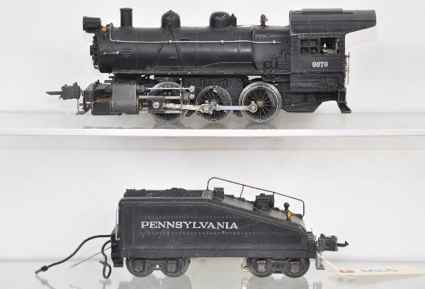 Lionel 227 Semi-Scale B6 Switcher: Circa 1940- 1 semi-scale steam switcher with high box couplers. Cab lettering is strong; 2227B slope back tender with bell & light, retains its original plugs. Lettering is even & strong on both sides