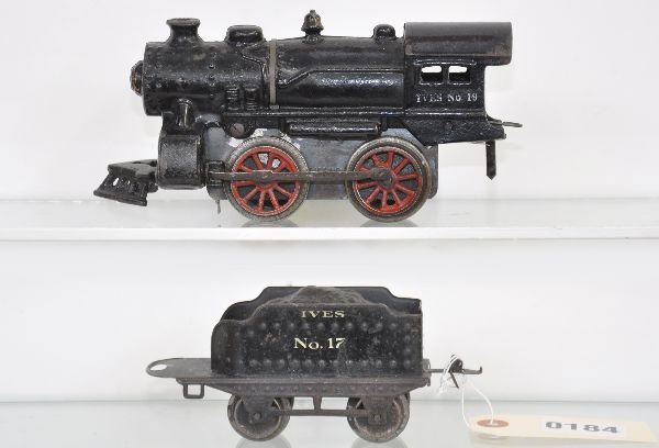 Ives 19 Steam Locomotive: Circa 1917. Cast boiler with strong lettering. Motor is clean & functional, dated 1917. 17 tender with coal pile. Both show moderate playwear, but clean, C6-