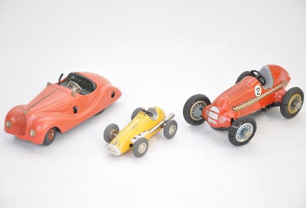 3 Schuco Vehicles: 1040 Micro Racer, C6; 4001 Examinico, faded, missing windscreen; 1050 Studio Racer, all functional and otherwise show light playwear, C7+