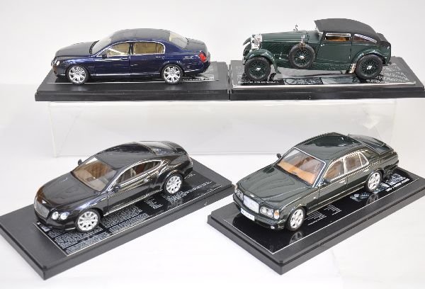 4 Minichamps 1:18 Bentleys: Super detailed die cast models. Includes 1930 Speed 6; 2002 Arrange T; 2005 Continental Flying Spur; Continental GT, all are like new with AMT display cases, C9