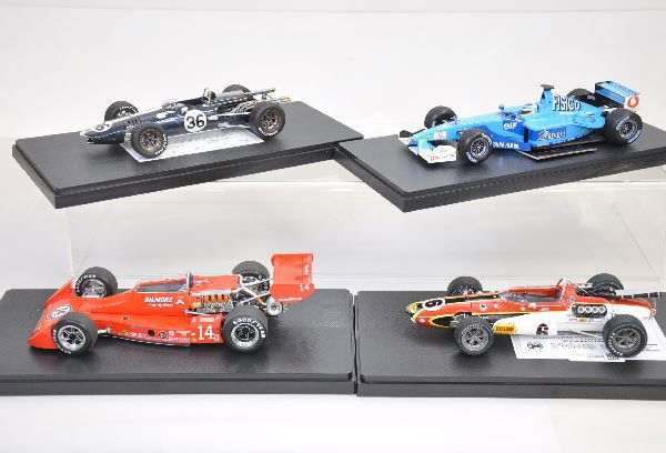 4 Minichamps & Carousel 1:18 Race Cars: Minichamps Benetton Renault B201; Carousel cars- AAR Eagle/Gurney-Westlake V12; AAR Eagle #6; 1977 AJ Foyt Indi Winner, all are highly detailed and have AMT plastic cases. Examine photos closely, or c