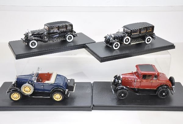 4 Diecast 1:24 Scale Cars: 1930 V16 Cadillac Special; 1932 Danbury Mint Cadillac V16; Motorcity 1931 Ford Model A; Motorcity 1931 Ford Model A convertible. All are highly detailed and have AMT plastic cases. Examine photos clos