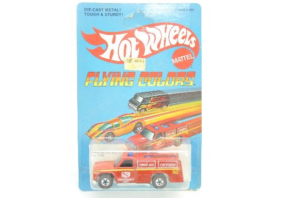 Scarce Hotwheels Redline Emergency Squad: 1975, #7650. Sealed on card, wear at lower edge, upper corner crease with punch C10. Examine photos closely, or call for more information, 203 730-1404.