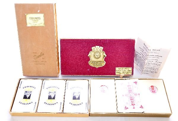 2 Early Playing Card Sets: Both are 3 pack sets. One is Congress Cel U-tone finish w/ landscape scene; Other is Piatnik Vienna, by Kings bridge, Austria w/ fancy backs & super picture card illustrations, both appear complete, b