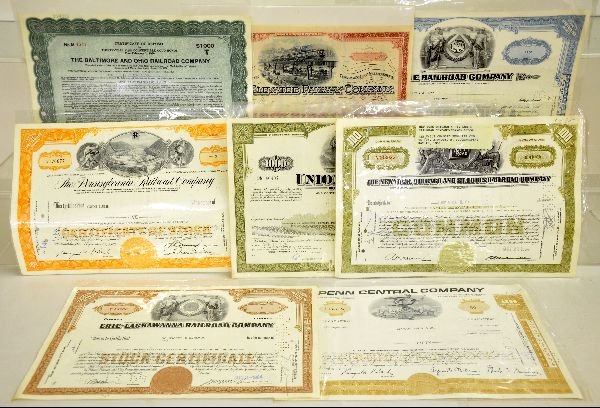 8 Railroad Stock Certificates: From Boston Elevated 1913; PRR, 1965; UP, 1974; Penn Central, 1965; Erie, 1958; NY, C&St, 1958; Erie, 1964 & B&O, 1939. All clean and ready for framing. Examine photos closely, or call for more inform