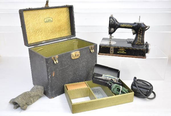 Osann Portable Electric Sewing Machine: Case measures 13 X 8 X 12", includes the nicely pinstripes main unit with scroll work on needle housing. Has foot pedal, many attachments and boxes. It is very clean looking, but package has significa