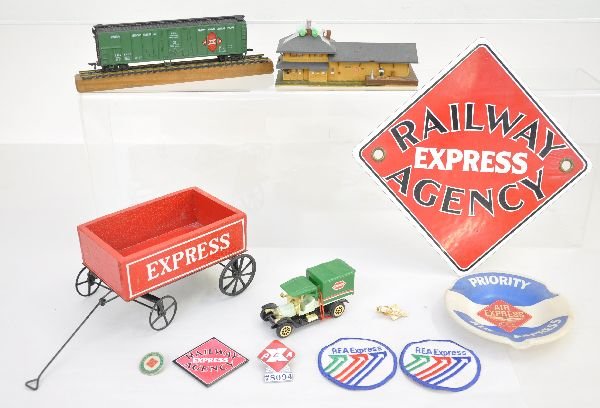 Vintage Railway Express Agency Items: Came from old employee of REA. Includes 8" wood wagon; 8" square metal 1 sided sign; Employee hat badge, tie clip & collar pin; plastic ashtray; 2 patches, magnet; HO train boxcar & station; toy truck