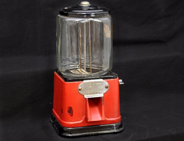 Vintage Victor Gum Ball Machine: 9 X 9 X 15" machine. Cast iron base with original glass globe, no key, functional. Has minor touch-up and shows moderate signs of use & age. Has a nice look. .