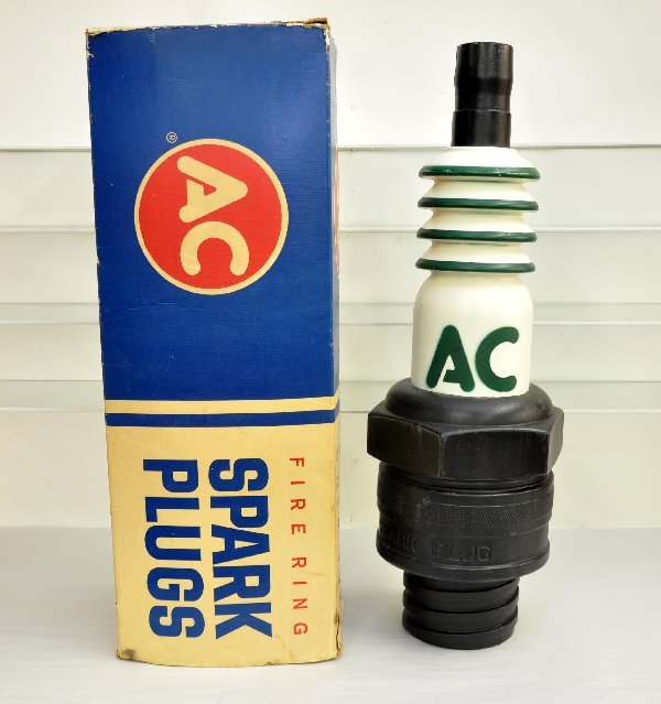 Vintage AC Fire Ring Spark Plug Display: Box measures 9 1/2 X 11 1/2 X 30 1/2", contains a plastic 3D spark plug. Shows light signs of use & age. .