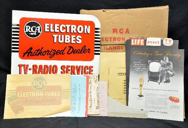 Mint RCA Dealer Promotional Packet: Includes an 18 X 14" enameled 3-color, 2-sided flanged metal sign; 13 X 16 die-cut cardboard counter sign with isle back, window decal, plastic ad cut & promotional literature all as new in original s