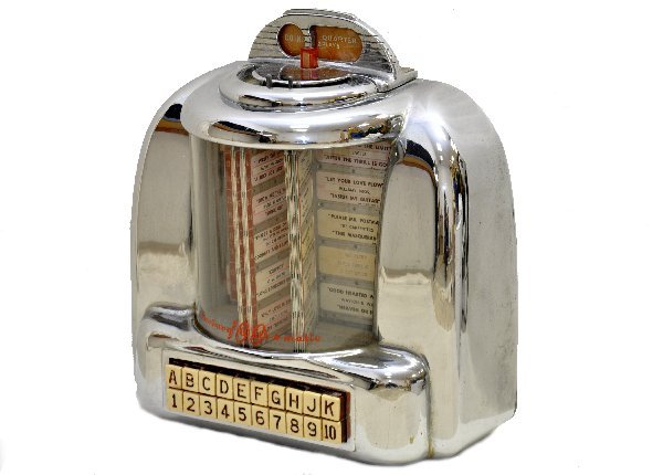 Seaburg 100 Wall-O-Matic Juke Box: 12 X 6 X 13". Circa 1950s deco styling, clean & shiny. 3 plays for 25 cents. Great iconic piece of diner memorabilia. .