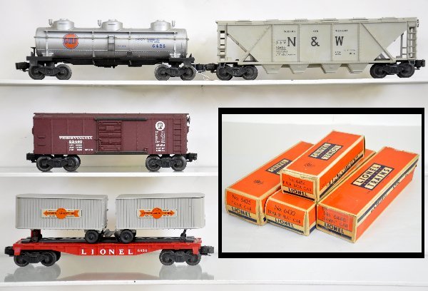 4 Boxed Lionel Freight Cars: 6446-54 N&W quadhopper, rough box; 6425 Gulf tank car; 6430 Flat with vans; 6454 PRR Boxcar, otherwise all have obs, C7+