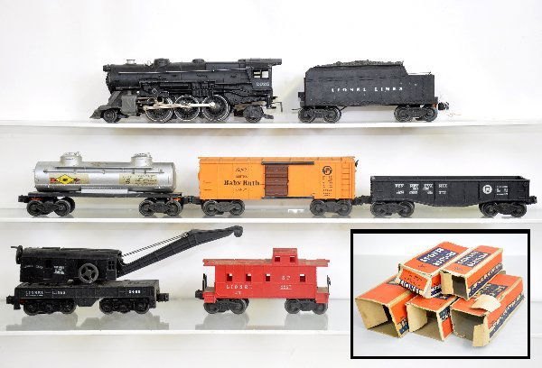 7 Pc. Lionel Train Set: 2025 Steam loco, early version with nickel stack; 6466WX tender; 2454 BR Boxcar, chipped catwalk; 2465 tank car; 2452 gondola; 2460 crane, crack to boom support; 2257 caboose, 5 rough obs, trains show