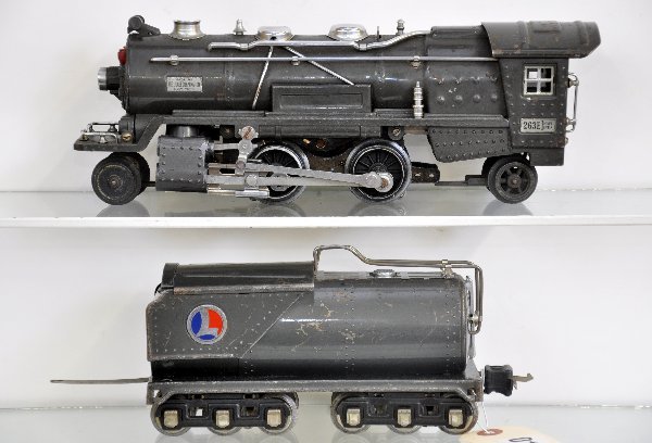 Lionel 263E Steam Locomotive: Clean & shiny, missing cow catcher with 1 replaced handrail; 2263W tender. Both show moderate playwear, C6-