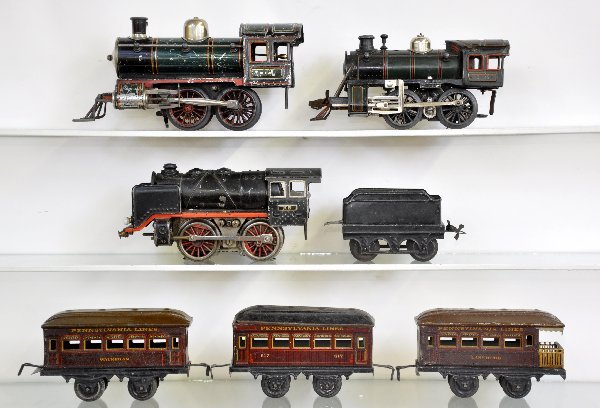 KBN & Bing Trains Group: 3 Bing PRR Passenger Cars; KBN American Outline loco, incomplete, functional; 1-35 green electric steam loco, missing roller; black loco & tender, electric, all show moderate to heavy playwear,. C5-6