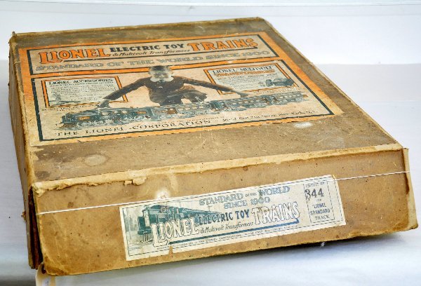 Empty Lionel Set Box 344: This is for a circa 1926 380 electric, 18 & 190 passenger cars. The labels are nice, though it has split corners, the inserts are present along with a quantity of track. There are no trains in this lo