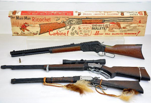 3 Cap Gun Rifles: 33" Marx Ricochet, working with 1 bullet & rough original box; 25" Mattel Winchester; 32" Rapid-Fire Challenger, missing strap. All show moderate playwear. Examine photos or call for more information