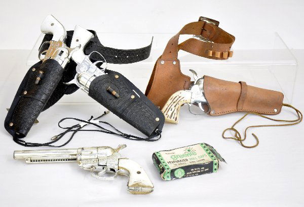 Mattel Fanner 50 Cap Gun & Holsters: Includes 4 guns, 3 are functional, 1 single & a double holster set, plus a partial box of Greenie cabs. All show moderate playwear. Examine photos or call for more information at 203 730-1404.