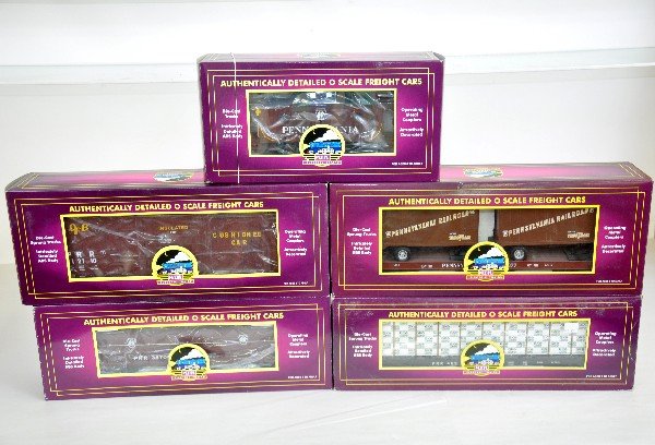 5 MTH PRR Freight Cars: 20-93307 hi-cube boxcar; 98175 bulkhead flat with lumber; 98400 coil car; 98104 flat with trailers; 91242 N6b caboose, all are like new with original boxes, C9