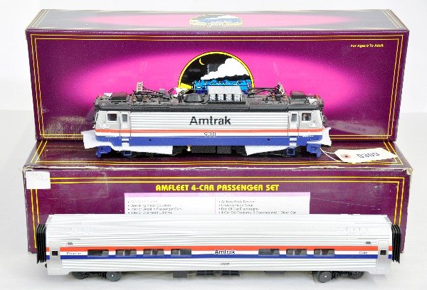 MTH Amtrak Metroliner Set: Includes 20-5505-1 REM-7 electric with ProtoSounds 1; 20-6519 Amfleet 4-car set. All test run with box & set box, C9