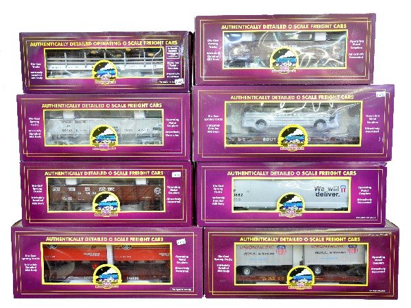8 MTH SP & UP Freight Cars: 98089 drop bottom gondola; 97533 center flow hopper; 98601 flat with pup trailers; 98107 flat with trailers; 98097 gondola; 98718 operating log dump car; 98830 flat with bus; 98838 gondola. All are li