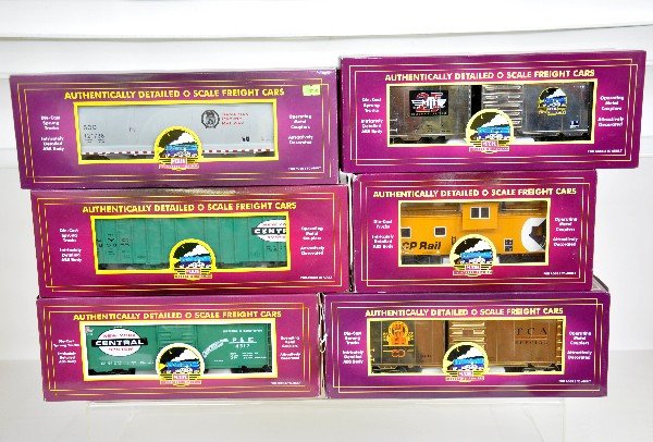 6 MTH Premier Freight Cars: 20-9324B boxcar; 97579 hopper; 93190 TCA boxcar; 97464 hopper; 91060 extended vision caboose; 93024 RRC boxcar. All like new with boxes, C9