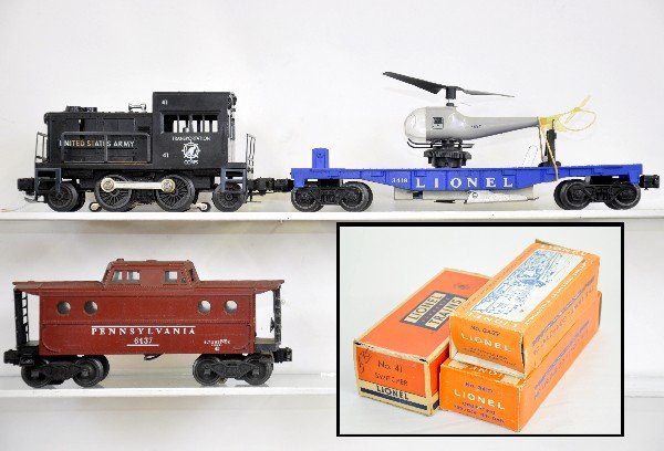 3Pc Boxed Lionel Train Set: 41 Army diesel, cab intact; 3419 helicopter car; 6437 N5c caboose with early frame. All show light to moderate playwear with rough original boxes, C7
