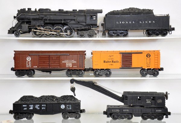 6Pc Lionel Steam Freight Set: 726 Berkshire loco, no cab lettering; 2426W cast tender; 2458 PRR boxcar; 2454 BR boxcar; 2460 crane; 2452 gondola with after market coal piece. All show moderate playwear, C6
