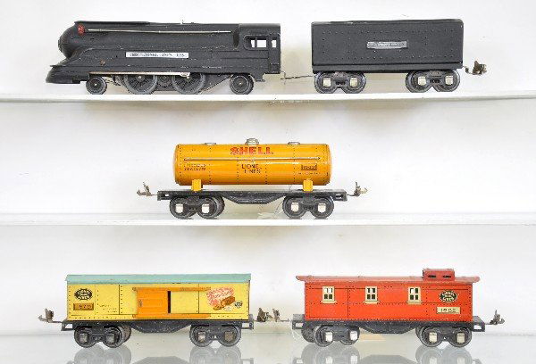 5Pc Lionel Steam Freight Set: 1668 streamline locomotive; 1689T tender; 1680 tank car; 1679 boxcar; 1682 caboose, all clean & shiny showing light playwear, C7+