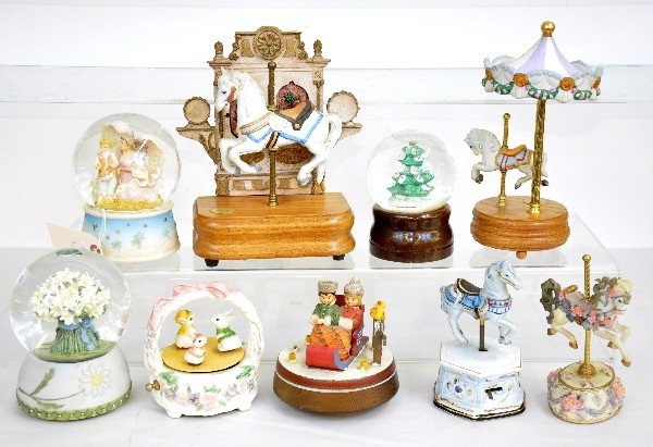 9 Assorted Music Boxes: All working with different themes. Some are very cute with animations, three are high quality snow globes as well. Examine photos or call for more information 203 730-1404.