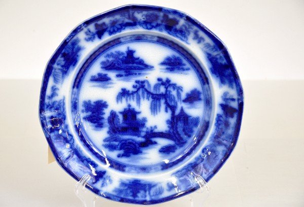 Early Flow Blue Plate: 9 1/2", clean, back marks Manila, PW&F Co, Ironstone. Unusual as it has part of pattern on back of rim as well. It is in great shape with no chips or crazing. Examine photos closely or call for more i